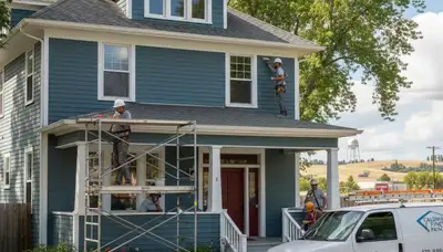 Boise, ID painting contractor applying interior paint in a residential home